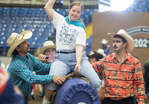 Exceptional rodeo contestant riding the bull display