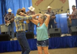 Man and women dancing on Senior Day