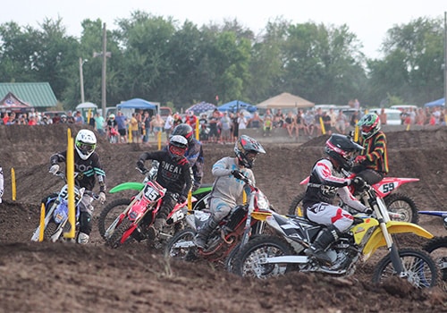 People riding motocross bikes