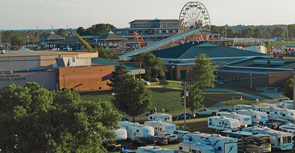 Aerial photo of the camp grounds, midway, Mathewson Exhibition Center and swine pavilion