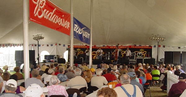 A crowd of people at the Budweiser Tent