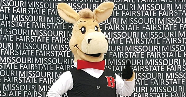 bart the Mule in front of a Missouri State Fair photo backdrop