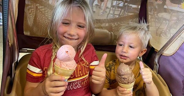 Two children eating ice cream