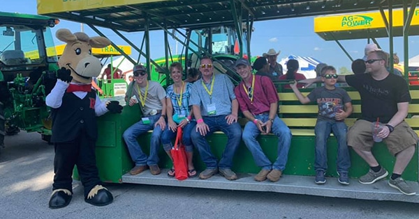 Bart the Mule standing by the tram with attendees