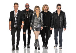 Members Only band members walking towards the camera on a white background