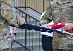 An American flag being folded