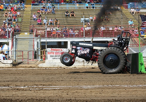 A tractor competing in the tractor pull contest