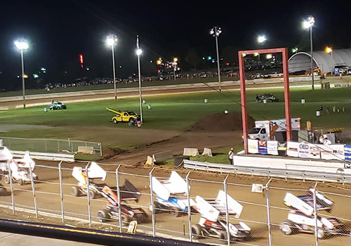 410 sprint cars racing around the grandstand track