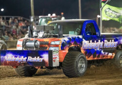A truck pulling at the State Fair Shootout